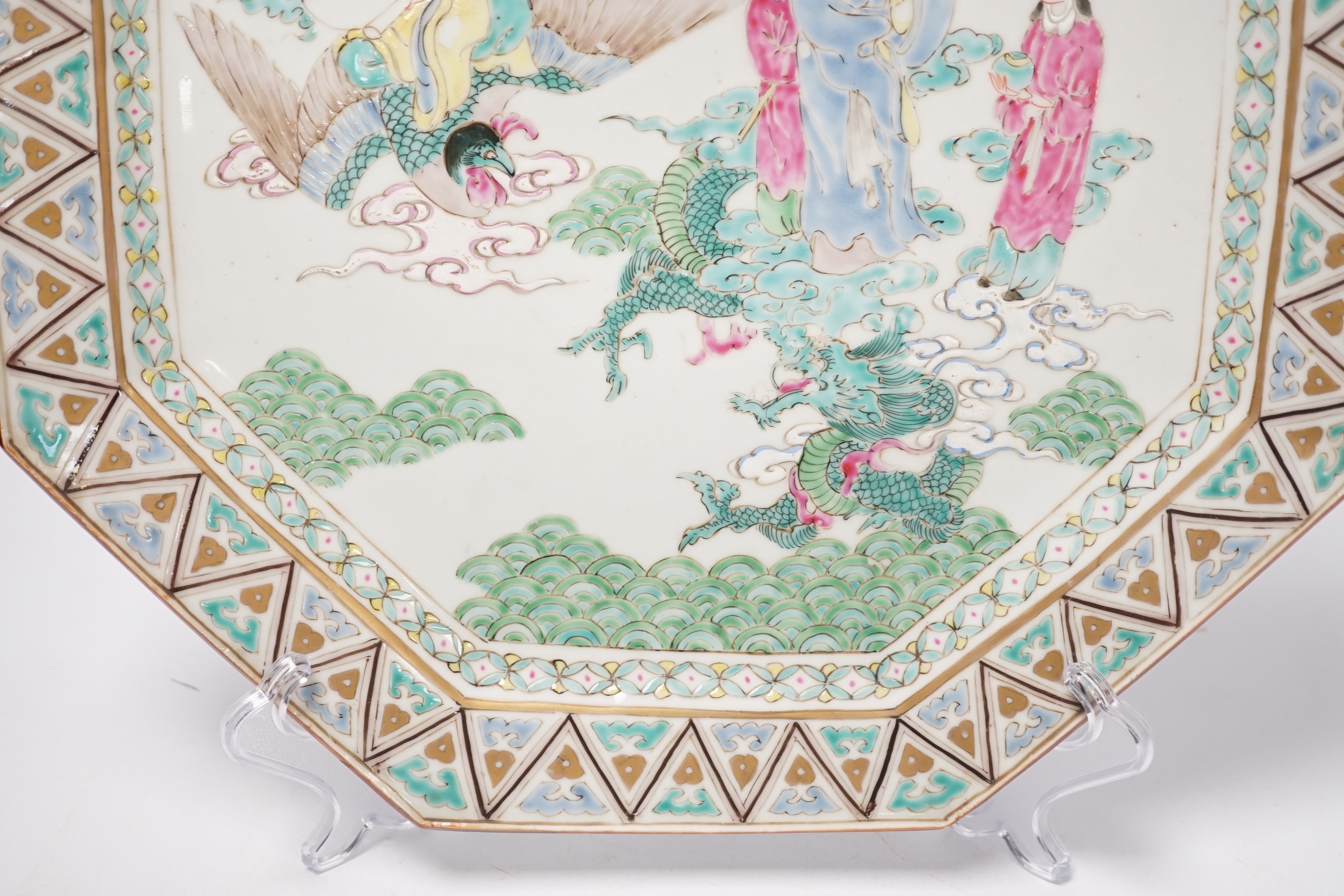 A Japanese porcelain octagonal dish enamelled with figures, dragon and bird, Meiji period, 36cm high